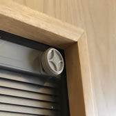 Glazed fire door with an integral blind system